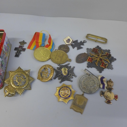 626 - A collection of medals, medallions and badges