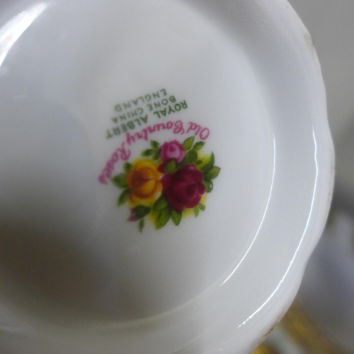 640 - Royal Albert Old Country Roses dinner and teawares, six setting with egg cups and toast rack