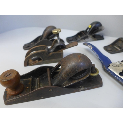 648 - A collection of nine woodworking planes