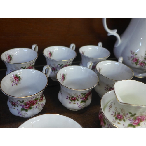 654 - A Royal Albert Lavender Rose six setting coffee service, one sugar bowl a/f