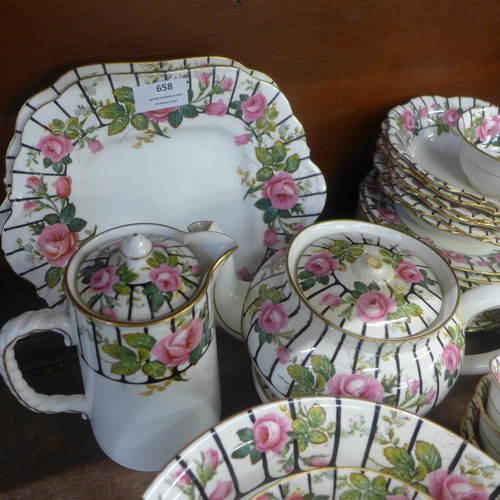 658 - Aynsley A3186 tea ware, teapot lid and one cup a/f, with water jug, fruit set, cake dishes, etc.