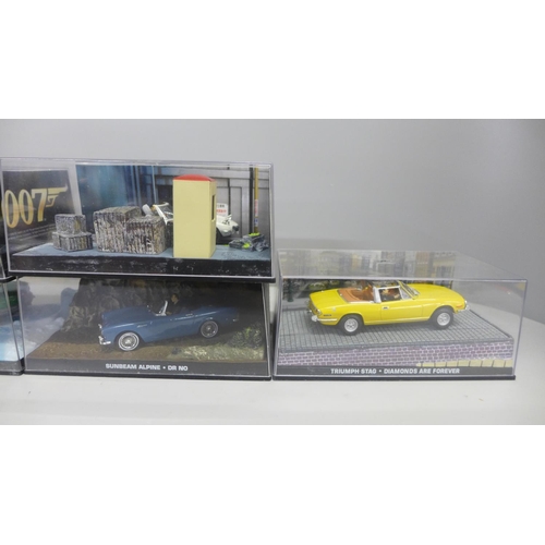 709 - Six cased James Bond die-cast model vehicles