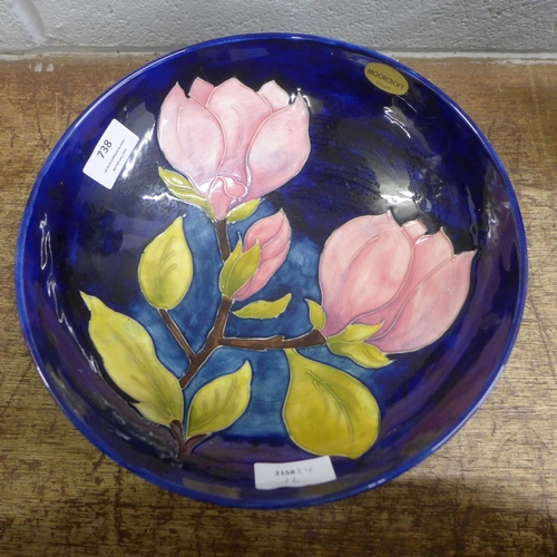 738 - A blue Moorcroft dish, signed by W. Moorcroft, 26.5cm