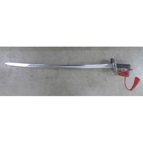 750 - A German made WWI troopers sword, the hilt with Maltese cross cut out, length of blade 86.5cm