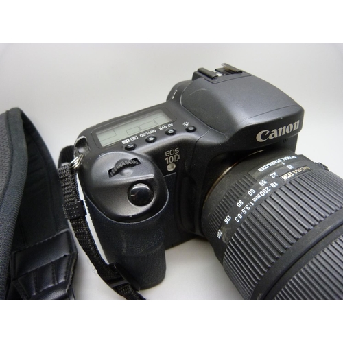 752 - A Canon D10 SLR digital camera with batteries, charger, etc., with Sigma 18:200mm lens