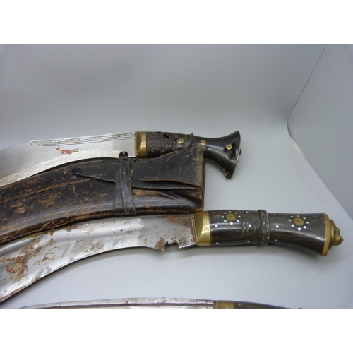 753 - Four Indian/Nepalese Kukri, one lacking scabbard