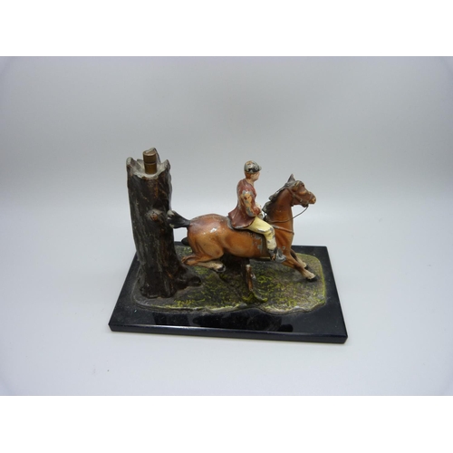 769 - A painted huntsman and hound table lighter, base 15cm