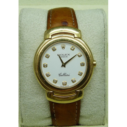 770 - An 18ct gold Rolex Cellini wristwatch, the markers set with diamonds, on a leather and 18ct gold str... 