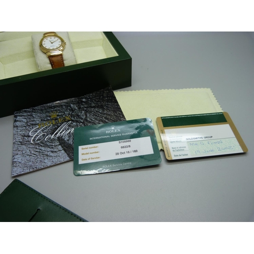 770 - An 18ct gold Rolex Cellini wristwatch, the markers set with diamonds, on a leather and 18ct gold str... 