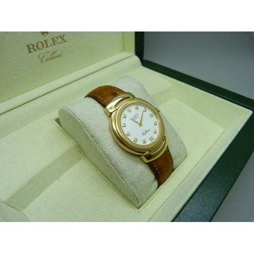 770 - An 18ct gold Rolex Cellini wristwatch, the markers set with diamonds, on a leather and 18ct gold str... 