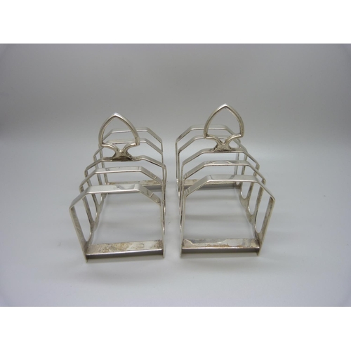 773 - A pair of silver toast racks, Sheffield 1932, by Viners, 228g