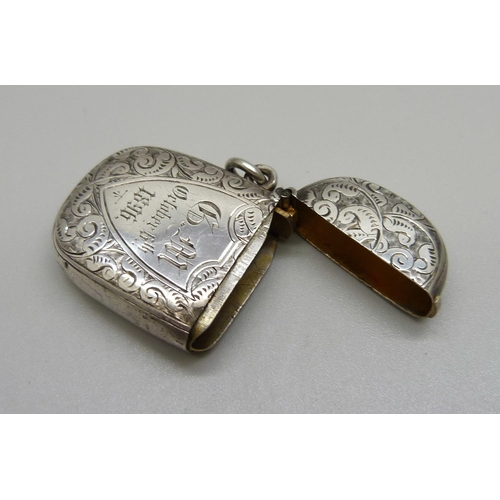 783 - A silver vesta case, Birmingham 1892, with inscription