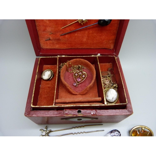 804 - A jewellery box containing Victorian/Edwardian items, mainly jewellery; an Art Nouveau pendant, a ca... 