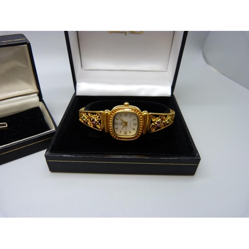 806 - A lady's silver Brookes and Bentley gem set wristwatch and a lady's Danbury Mint wristwatch