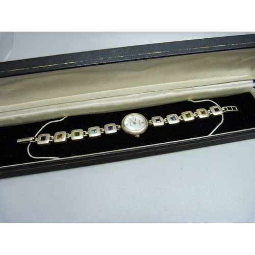 806 - A lady's silver Brookes and Bentley gem set wristwatch and a lady's Danbury Mint wristwatch