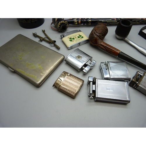 810 - Cigarette lighters, pipes, John Player black plastic box, etc.