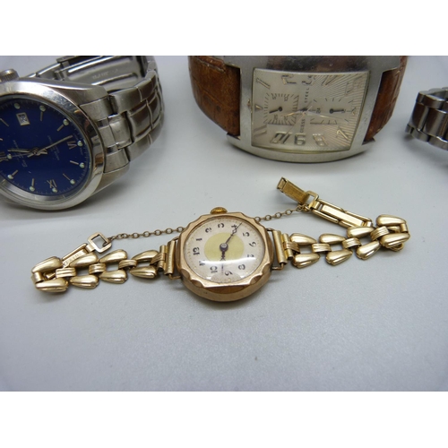 822 - A Guess designer wristwatch, Ben Sherman and Fishbone wristwatch and a lady's rolled gold wristwatch... 