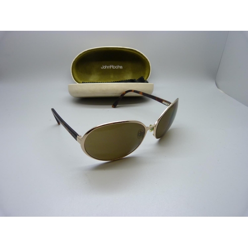 825 - A pair of lady's John Rocha sunglasses in original case