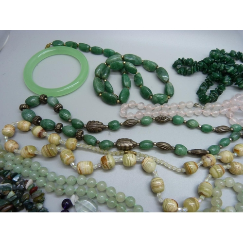 829 - A collection of bead necklaces including pearl, amethyst and jadeite