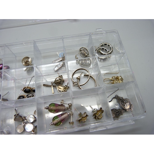 830 - Eighteen pairs of silver earrings