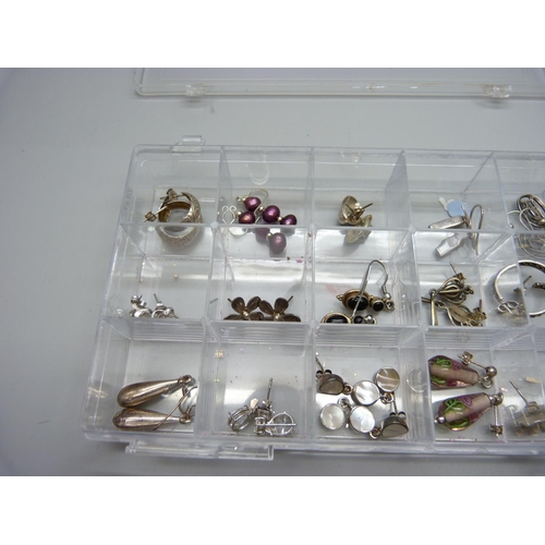 830 - Eighteen pairs of silver earrings