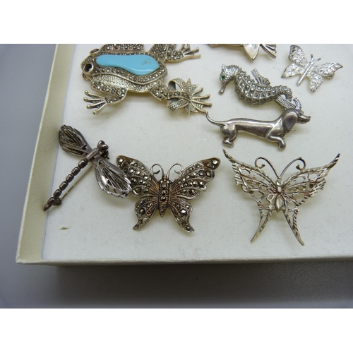 831 - A collection of eight silver animal brooches, some stones missing