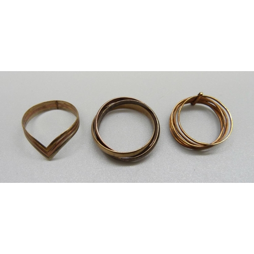 844 - Two 9ct gold rings, 4.7g, M and O, and a yellow metal ring, 2g, K