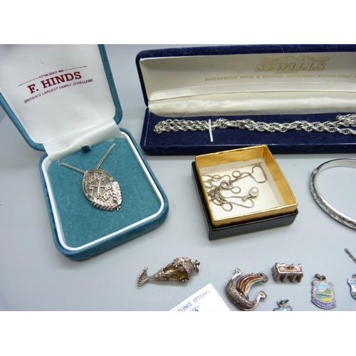 856 - Silver jewellery including a bangle and silver charms