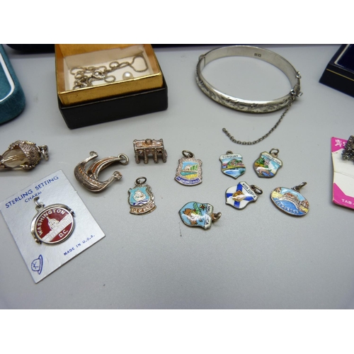 856 - Silver jewellery including a bangle and silver charms