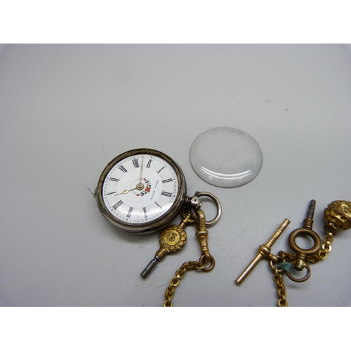 869 - An 800 silver fob watch, (glass loose), with plated Albertina