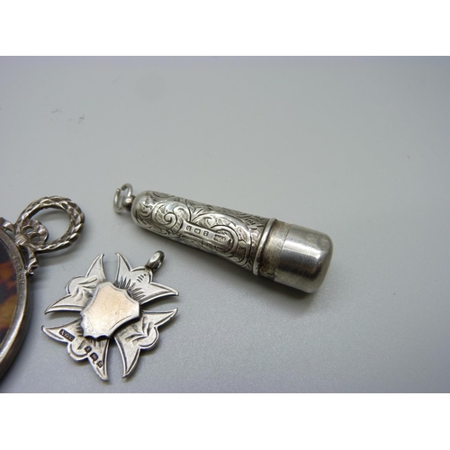 878 - A late Victorian silver mounted handbag mirror, a silver cheroot holder case and a silver fob