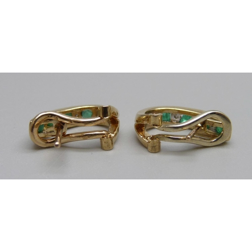 885 - A pair of 9ct gold, diamond and emerald earrings, 3.4g