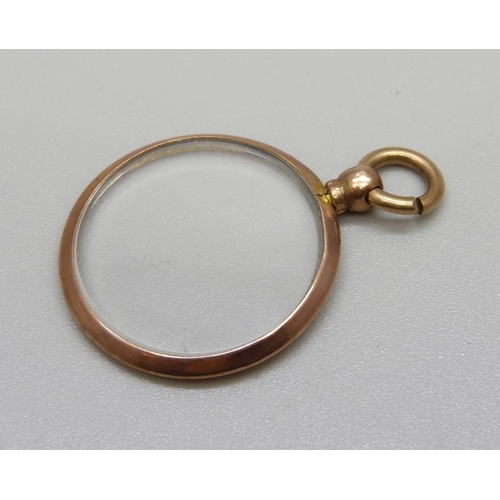 887 - A 9ct gold picture locket, Birmingham 1910, 23mm