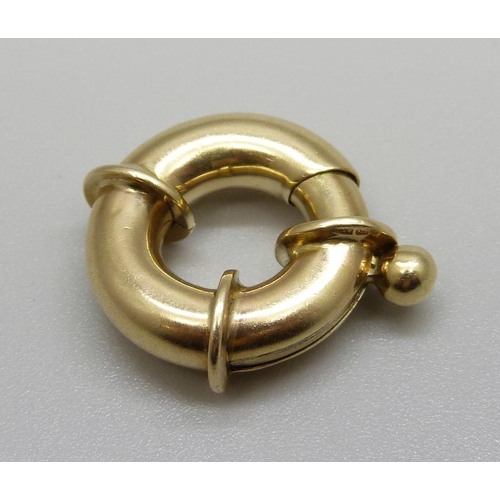 889 - A large 9ct gold bolt fastener, 4.9g