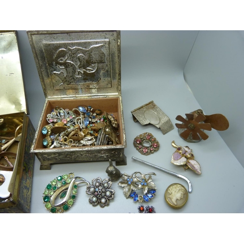 892 - Two tins of vintage costume jewellery, etc.