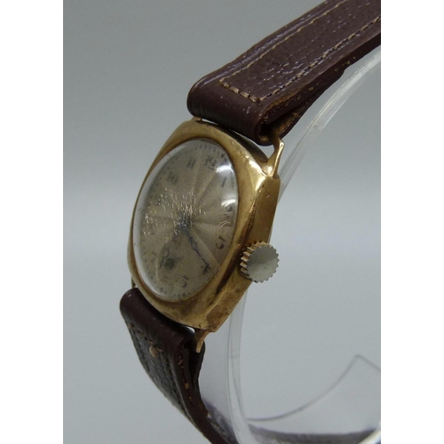 936 - A 9ct gold wristwatch, Chester 1931, case back 2.1g, 26mm case, a/f, dented