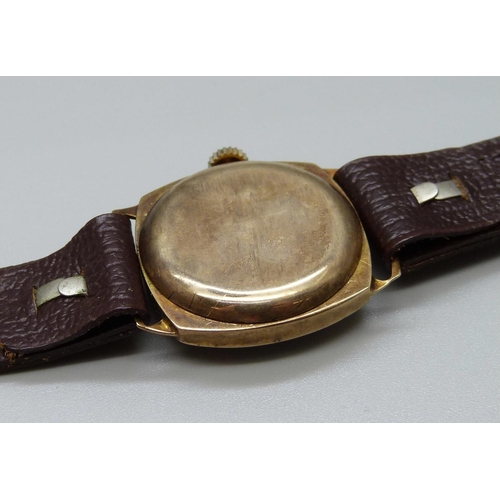 936 - A 9ct gold wristwatch, Chester 1931, case back 2.1g, 26mm case, a/f, dented