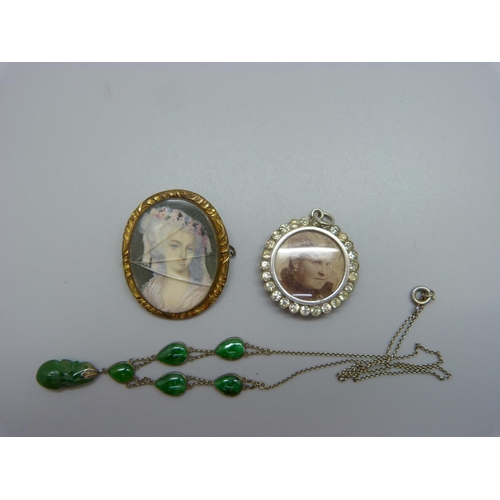 939 - A jade set necklace, a picture pendant and a brooch lacking pin, a/f