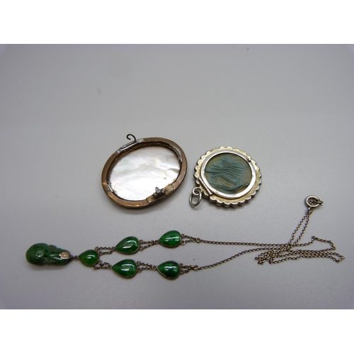 939 - A jade set necklace, a picture pendant and a brooch lacking pin, a/f