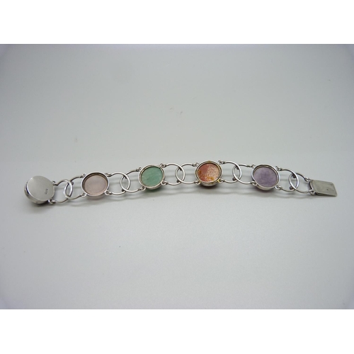 976 - An Arts and Crafts silver and five agate roundel bracelet