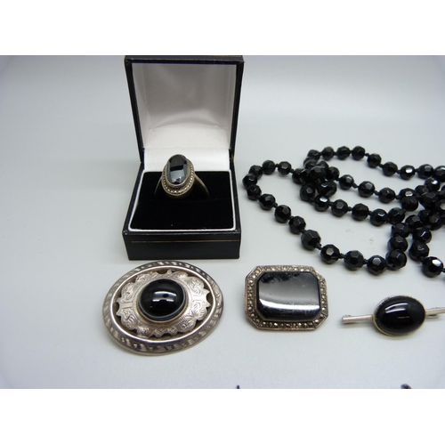 987 - A collection of silver mounted jewellery and a French jet bead necklace