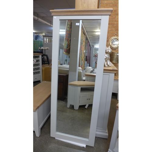 1413 - A tall rectangular mirror  * This lot is subject to VAT