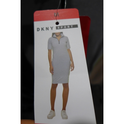 3088 - 2 DKNY women's sport dresses - mixed colours - both size M * this lot is subject to VAT