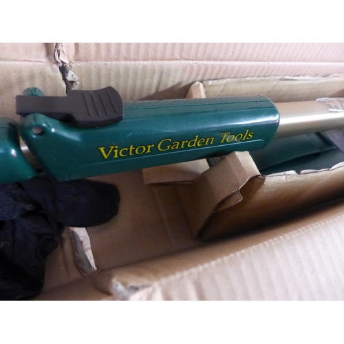 2135 - Victor cordless long reach hedge cutters with charger module - W