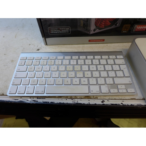 2253 - Apple bluetooth/cordless keyboard, Apple Mini Mac computer & Xilence power 1KW supply