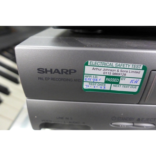 2283 - Sharp VHS video recorder and Sony DVD player