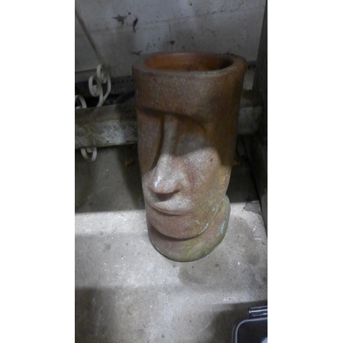 2442 - Qty. of terracotta planters with stone head planter