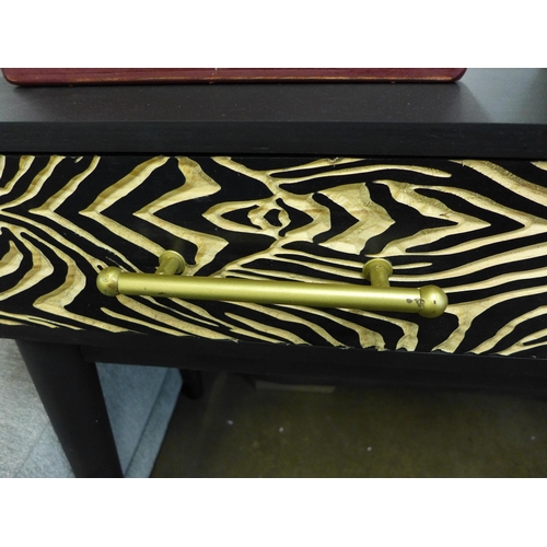 1352 - A two drawer zebra design console table