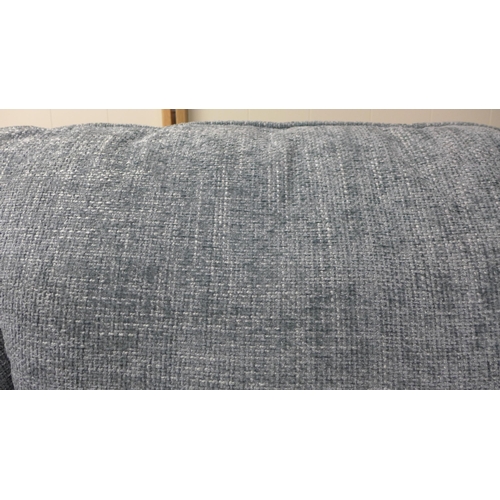 1396 - An aquamarine upholstered three seater sofa