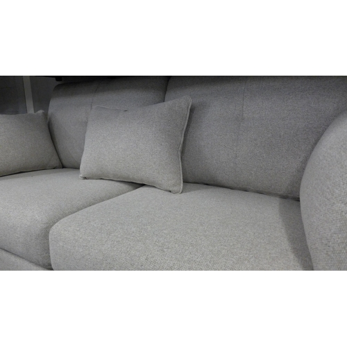 1443 - A light stone two seater sofa